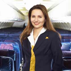 Female Flight Attendant Smiles for Photo