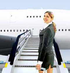 Airline Flight Attendant Poses for Photo While Boarding Airplane
